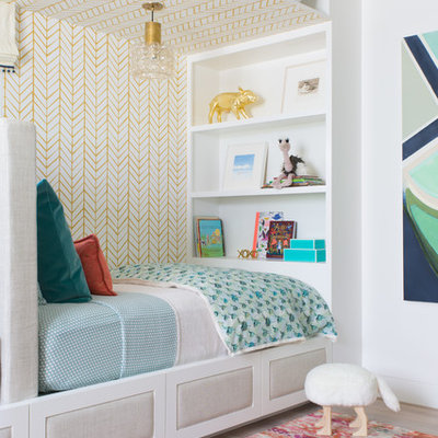 Inspiration for a transitional gender-neutral light wood floor kids' bedroom remodel in San Francisco with multicolored walls