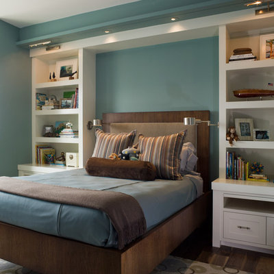 Example of a transitional boy dark wood floor kids' room design in San Francisco with blue walls