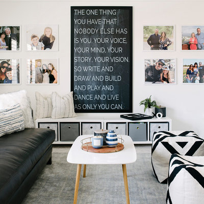 Mid-sized trendy gender-neutral carpeted and gray floor kids' room photo in Orange County with white walls