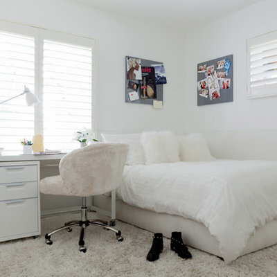 Inspiration for a huge contemporary girl light wood floor kids' room remodel in Los Angeles with white walls