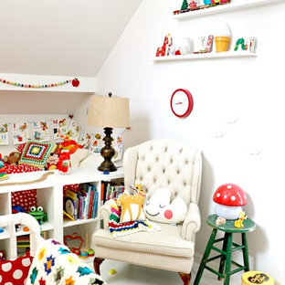Mid-sized danish gender-neutral painted wood floor and white floor kids' room photo in Las Vegas with white walls