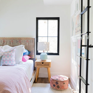 Kids' room - country dark wood floor and brown floor kids' room idea in San Francisco with white walls