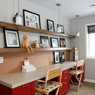 Trendy gender-neutral carpeted kids' study room photo in Calgary with gray walls