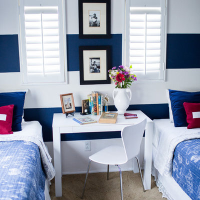 Inspiration for a coastal boy carpeted kids' bedroom remodel in Los Angeles with multicolored walls