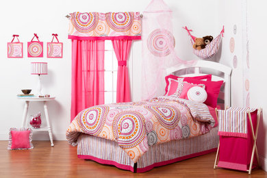 Example of a trendy girl kids' room design in Omaha