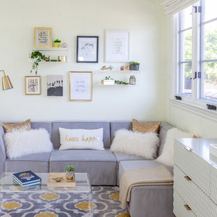 Kids' room - large contemporary girl dark wood floor and brown floor kids' room idea in Los Angeles with beige walls