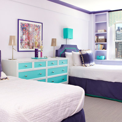 Example of a minimalist girl carpeted kids' room design in New York with purple walls