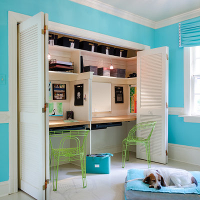 Example of a trendy kids' room design in Richmond with blue walls