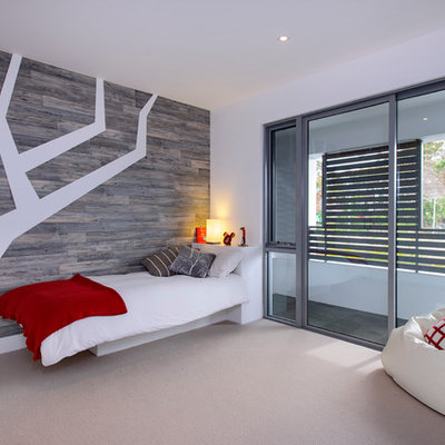 Inspiration for a contemporary beige floor kids' bedroom remodel in Sydney