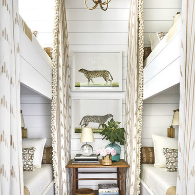 Inspiration for a coastal gender-neutral kids' room remodel in Jacksonville with white walls