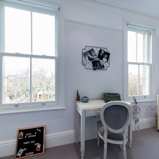Design ideas for a large traditional kids' study space for girls in London with carpet, grey floors and grey walls.