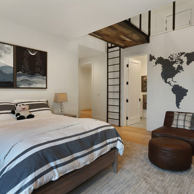 Inspiration for a contemporary gender-neutral light wood floor and beige floor kids' bedroom remodel in Orange County with white walls