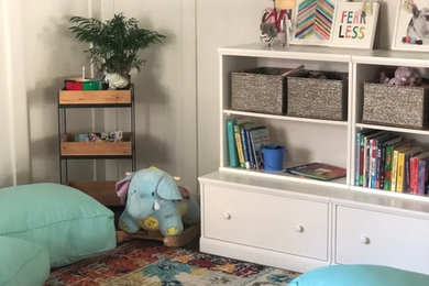 Kids' room - eclectic kids' room idea in Other with blue walls