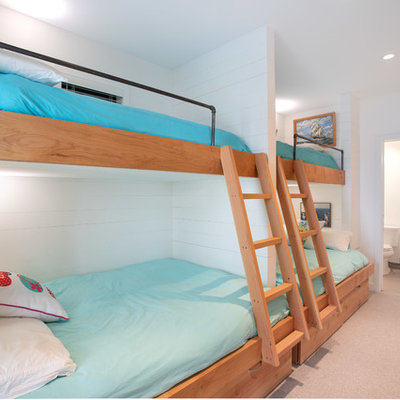 Kids' room - coastal gender-neutral carpeted and gray floor kids' room idea in Vancouver with white walls