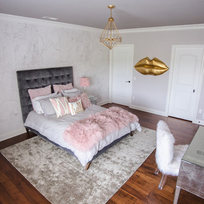Mid-sized minimalist girl brown floor kids' room photo in Other with white walls