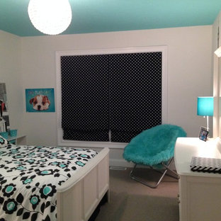 Small transitional girl carpeted kids' room photo in Cleveland with white walls