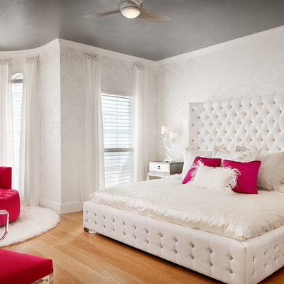 Kids' room - large contemporary girl medium tone wood floor kids' room idea in Austin with white walls