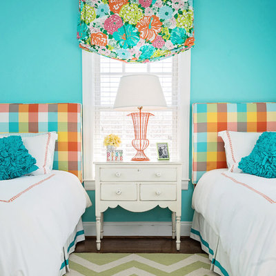 Kids' room - traditional girl dark wood floor kids' room idea in Baltimore with blue walls