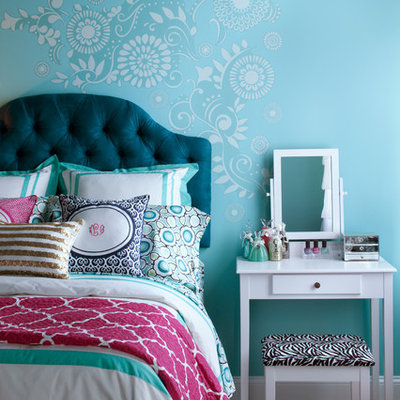 Inspiration for a mid-sized contemporary girl light wood floor and beige floor kids' room remodel in Atlanta with blue walls
