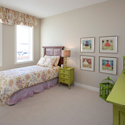Example of a classic girl kids' room design in Calgary with gray walls