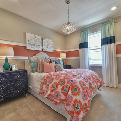 Kids' room - mid-sized traditional girl carpeted and beige floor kids' room idea in Orlando with multicolored walls