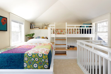 Photo of a farmhouse children’s room for girls in Burlington with beige walls, carpet and beige floors.