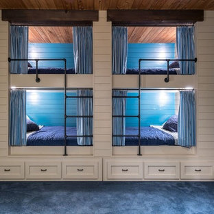 Inspiration for a rustic boy carpeted kids' bedroom remodel in Atlanta with blue walls