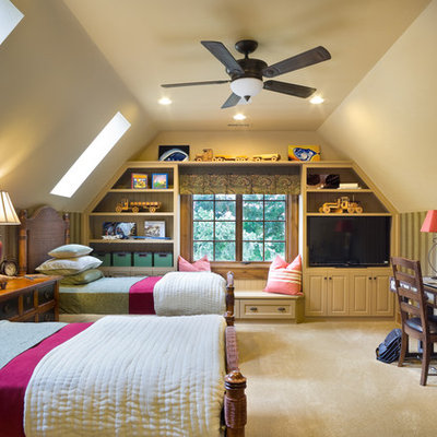 Example of a classic gender-neutral carpeted kids' room design in Portland with beige walls