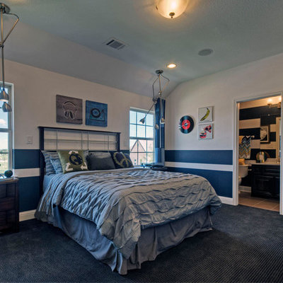 Mid-sized trendy boy carpeted kids' room photo in Dallas with multicolored walls