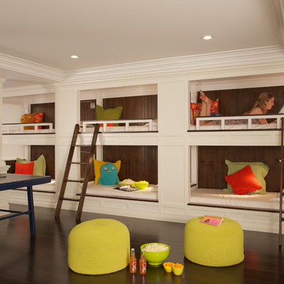 Inspiration for a timeless dark wood floor and brown floor kids' room remodel in New York with beige walls