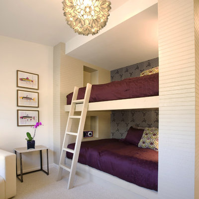 Inspiration for a mid-sized transitional girl carpeted and white floor kids' room remodel in New York with white walls