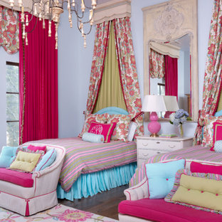 Example of a tuscan girl dark wood floor kids' bedroom design in St Louis with purple walls
