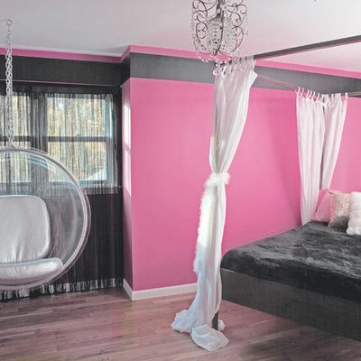 Kids' room - contemporary girl kids' room idea in New York with multicolored walls