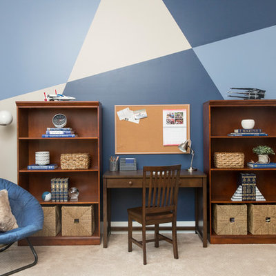 Inspiration for a mid-sized transitional boy carpeted and beige floor kids' room remodel in Nashville with beige walls