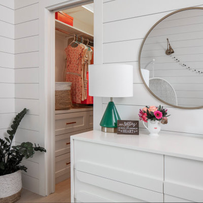 Kids' room - mid-sized transitional girl medium tone wood floor and brown floor kids' room idea in Austin with white walls