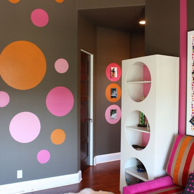 Teen room - contemporary medium tone wood floor and brown floor teen room idea in Orange County with multicolored walls