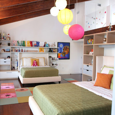 Mid-sized trendy girl dark wood floor and brown floor kids' room photo in Miami with white walls