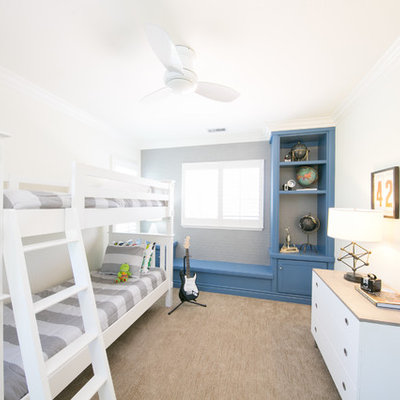 Inspiration for a coastal boy carpeted and beige floor kids' room remodel in Orange County with gray walls