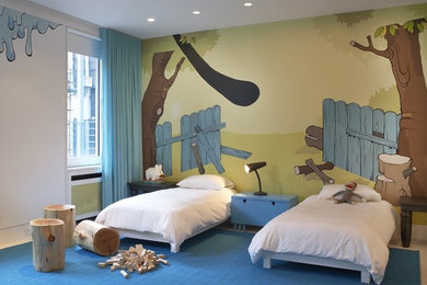 Example of a large minimalist gender-neutral carpeted kids' room design in New York with multicolored walls