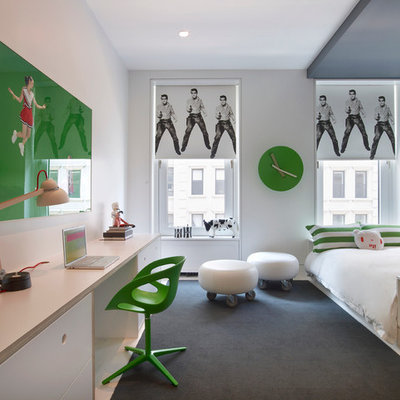 Mid-sized trendy gender-neutral carpeted kids' room photo in New York with white walls