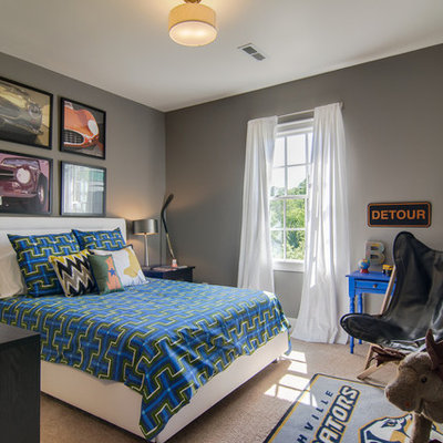 Mid-sized trendy boy carpeted kids' room photo in Birmingham with gray walls
