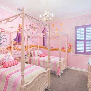 Inspiration for a mediterranean girl carpeted and gray floor kids' bedroom remodel in Orlando with pink walls