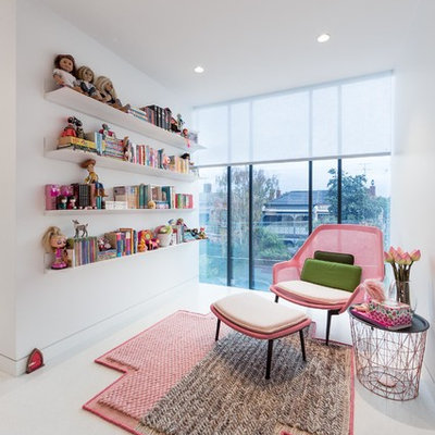 Mid-sized trendy girl kids' room photo in Melbourne with white walls
