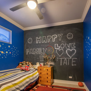 Mid-sized contemporary gender-neutral kids' bedroom in Newcastle - Maitland with blue walls, concrete floors and beige floor.
