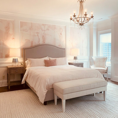 Kids' room - transitional girl medium tone wood floor, brown floor and wall paneling kids' room idea in Atlanta with pink walls