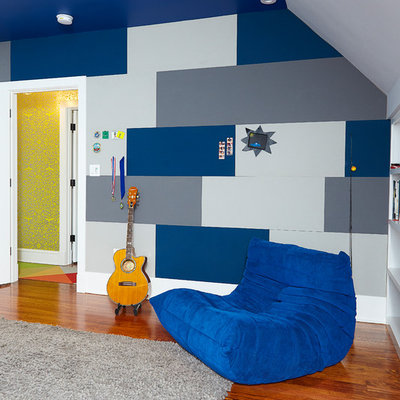 Kids' room - large modern boy medium tone wood floor and brown floor kids' room idea in Wilmington with gray walls