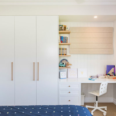 Inspiration for a transitional girl beige floor kids' room remodel in Brisbane with white walls