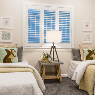 Traditional kids' bedroom in Brisbane with beige walls, carpet and grey floor.