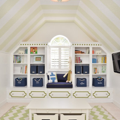 Example of a transitional gender-neutral carpeted kids' room design in Orlando with white walls