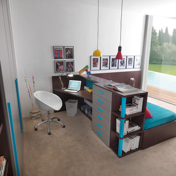 Schreibtisch und Bett als Raumteiler für das Jugendzimmer